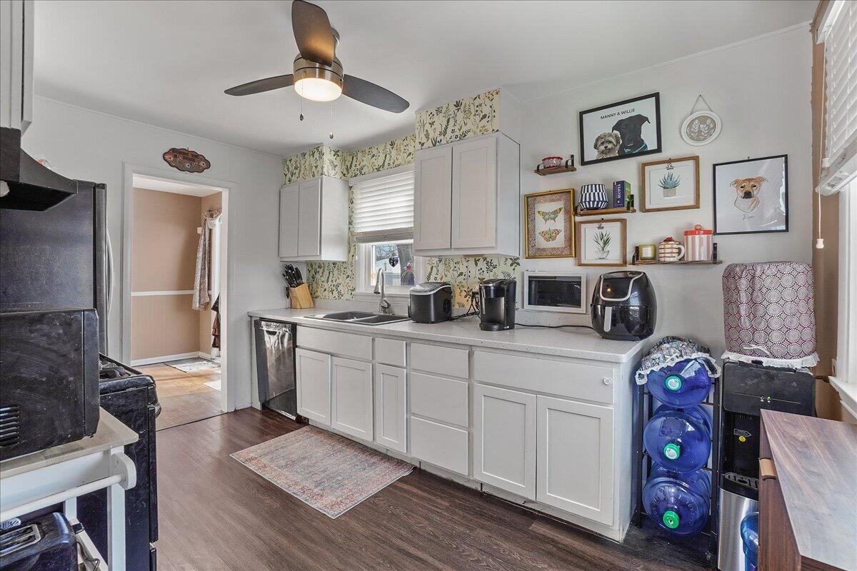 3340 Maple Drive Highland, IN 46322 - Photo 6 of 29 a kitchen with stainless steel appliances granite countertop a refrigerator and a stove top oven