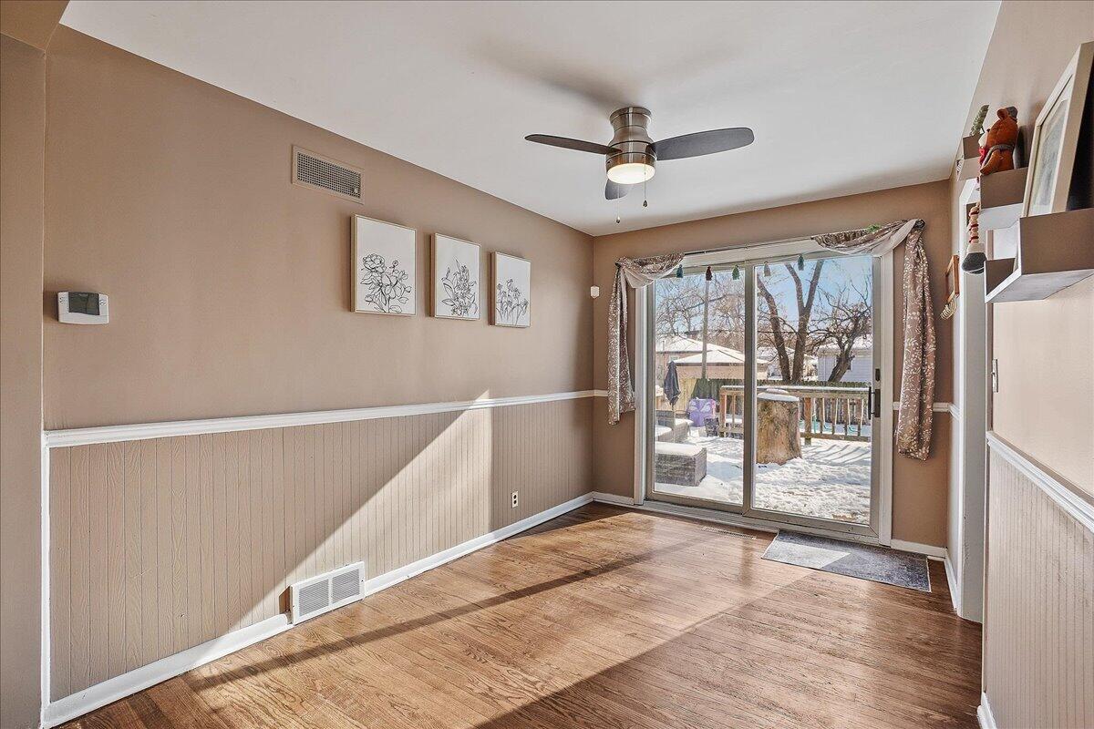 3340 Maple Drive Highland, IN 46322 - Photo 10 of 29 a view of empty room with wooden floor and fan