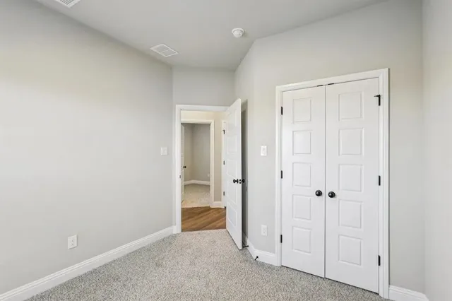 wooden floor and closet in a room
