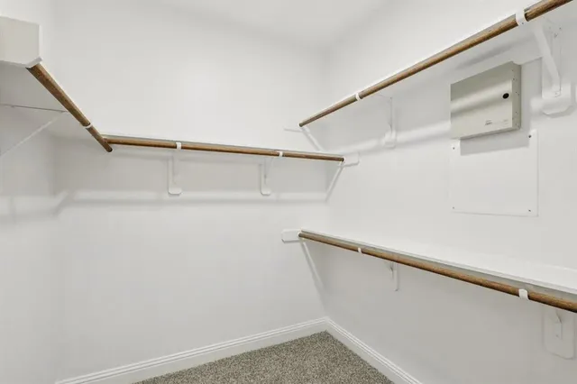 a bathroom with a sink double vanity and a mirror