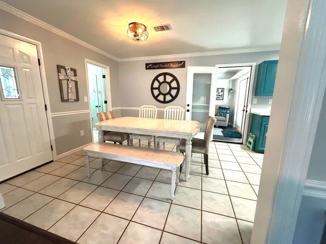 a bedroom with a bed and a table