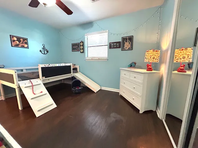 a room with furniture and a window