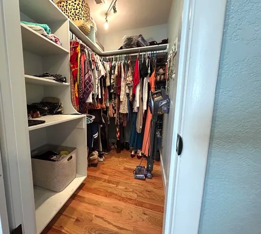 a view of a windows and a fireplace wooden floor