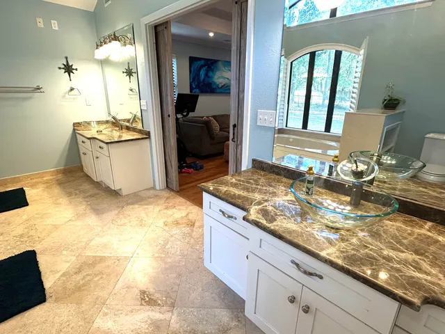 a bathroom with a sink and a bathtub