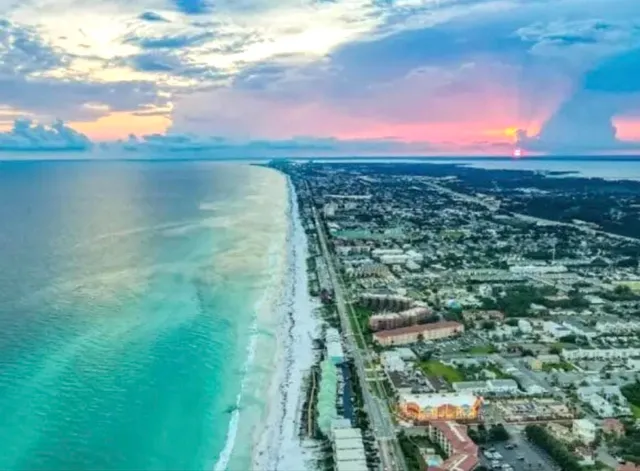 a view of a city with an ocean