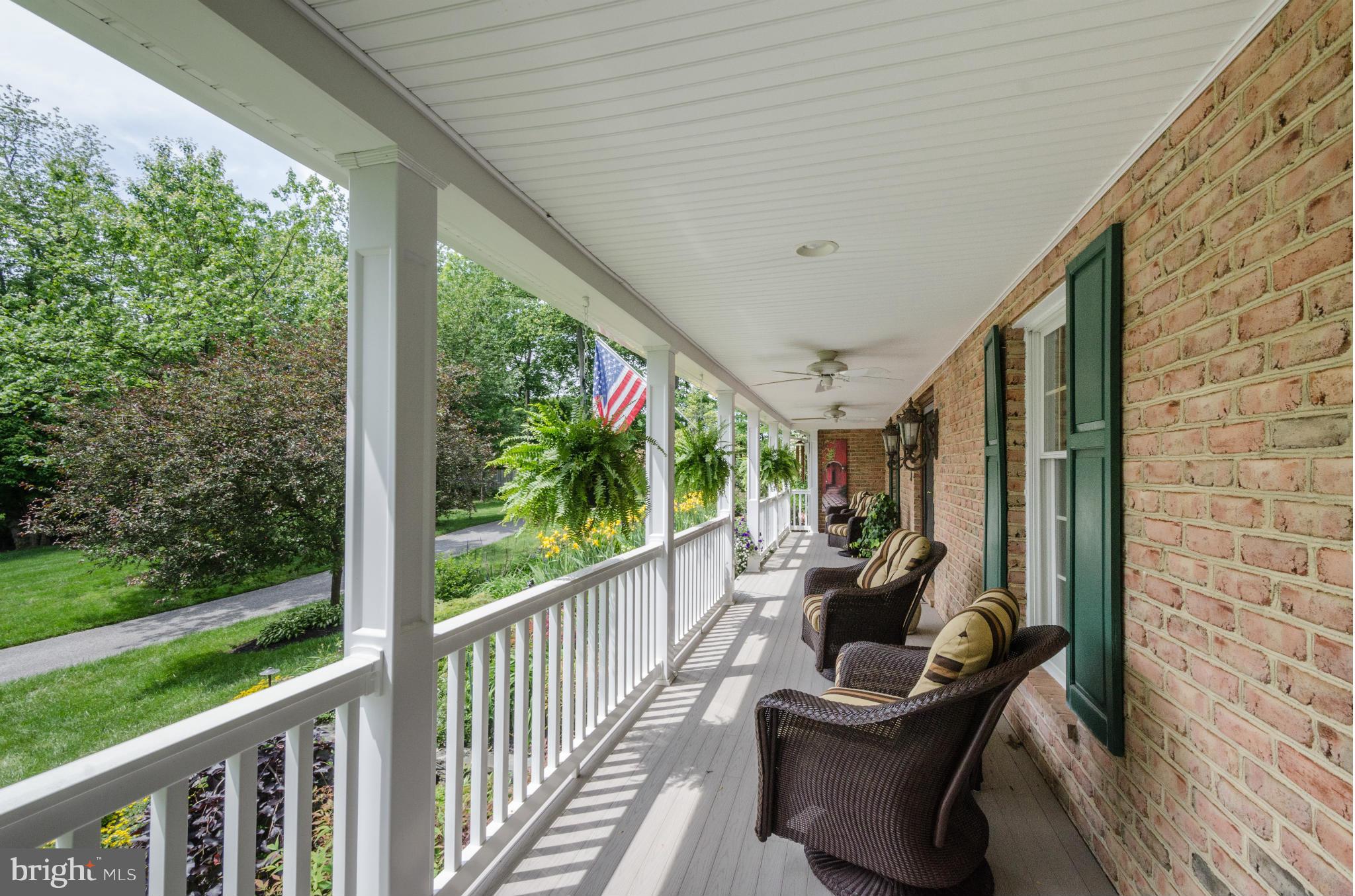 14507 Old York Road Phoenix, MD 21131 - Photo 4 of 30 Expansive front and side wrap-around porch