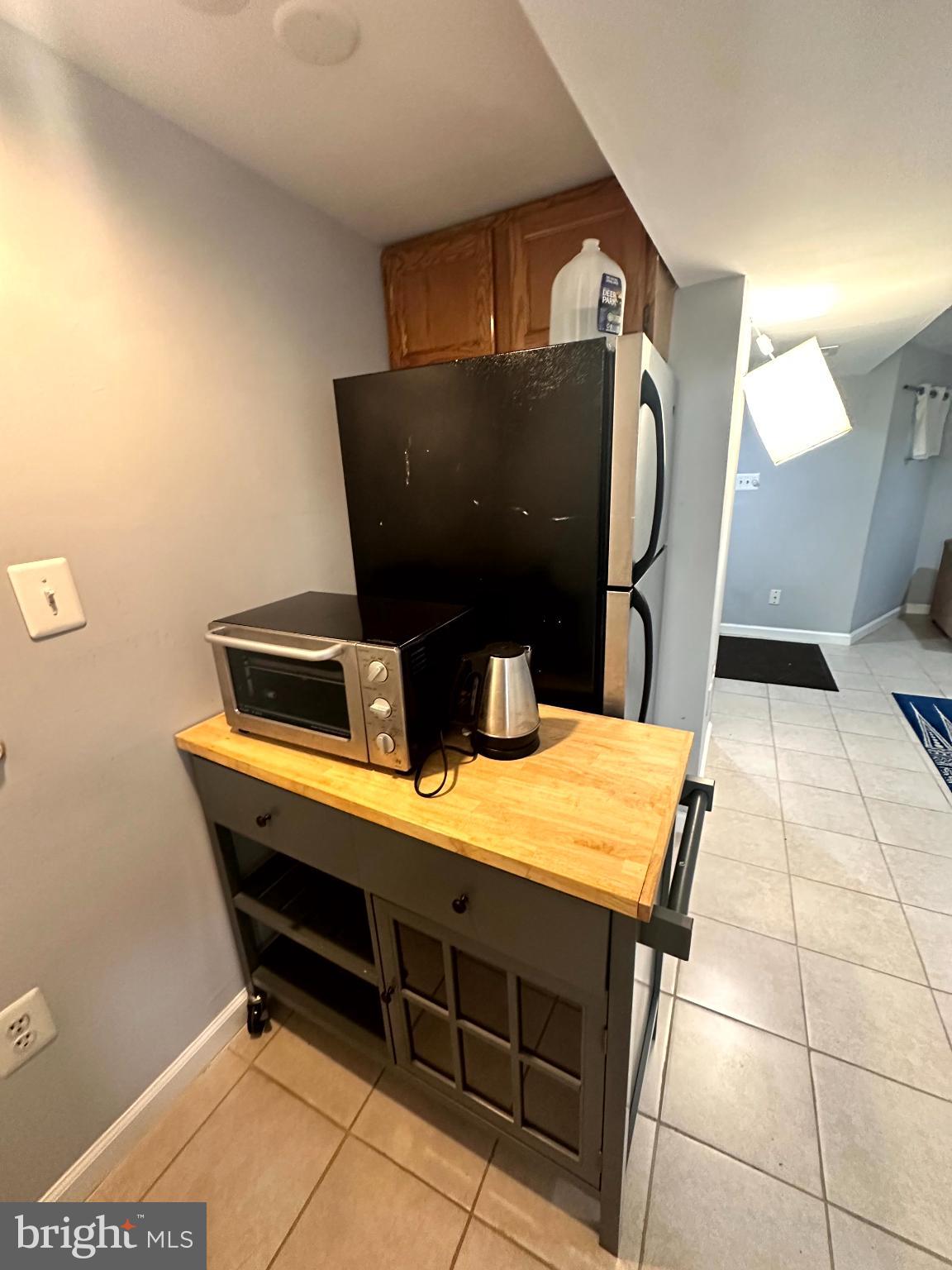 60 Q Street Northwest Washington, DC 20001 - Photo 12 of 12 Cozy kitchen nook with modern appliances.