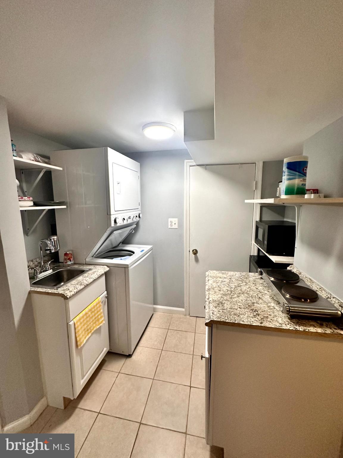 60 Q Street Northwest Washington, DC 20001 - Photo 4 of 12 Cozy kitchen with modern appliances.