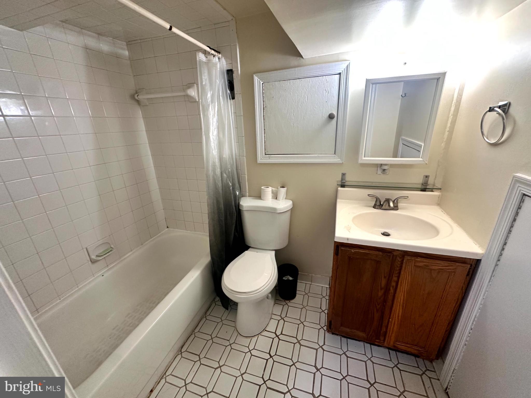 60 Q Street Northwest Washington, DC 20001 - Photo 7 of 12 Cozy bathroom with modern touches.