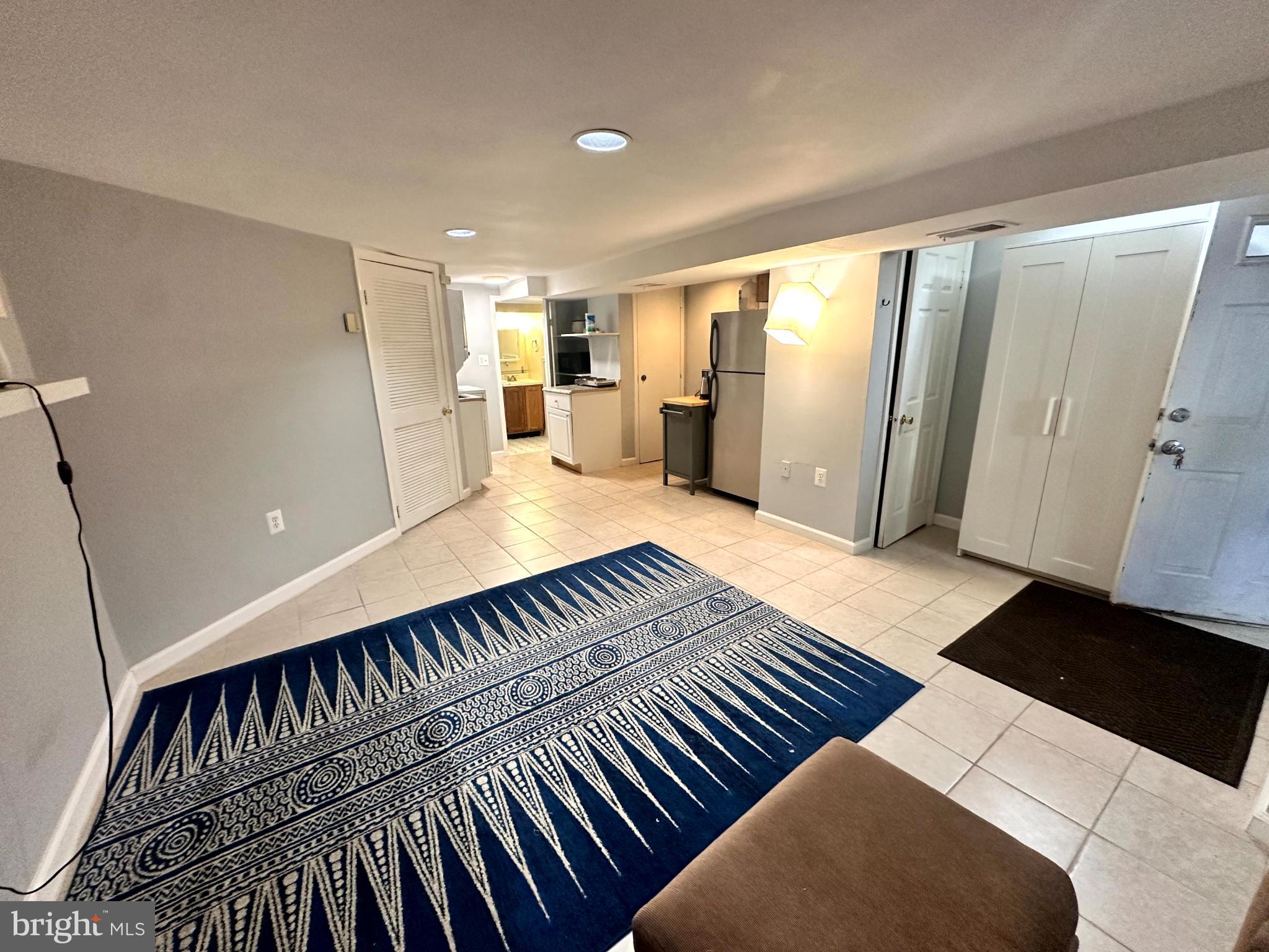 60 Q Street Northwest Washington, DC 20001 - Photo 8 of 12 Spacious basement retreat with modern charm.