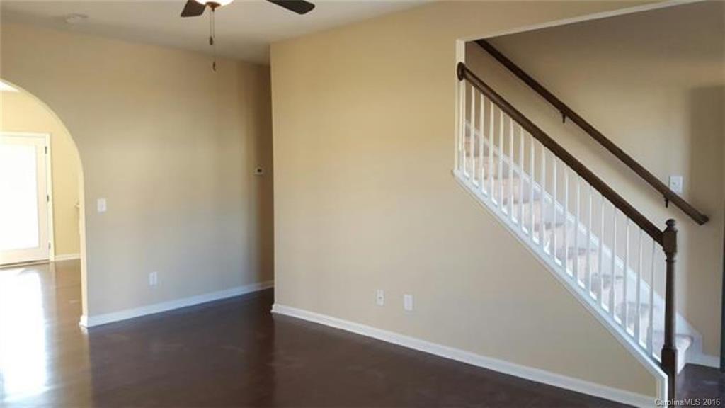 617 School House Lane, Unit 29 Fort Mill, SC 29708 - Photo 2 of 13 a view of staircase with wooden floor and a window