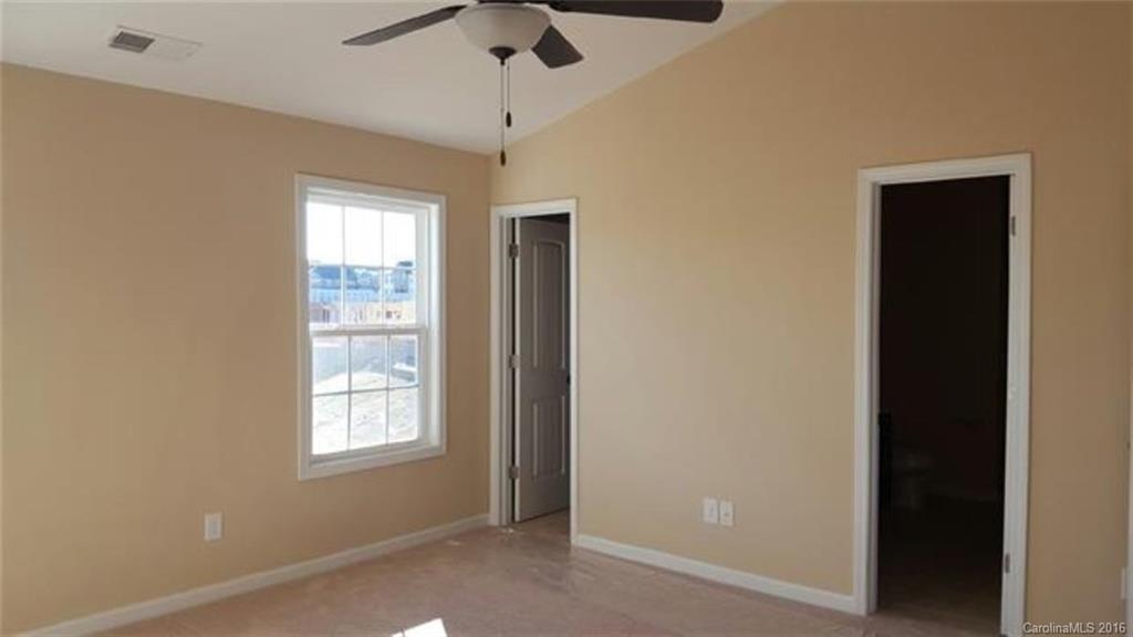 617 School House Lane, Unit 29 Fort Mill, SC 29708 - Photo 9 of 13 a view of an empty room with a window