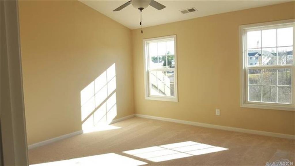 617 School House Lane, Unit 29 Fort Mill, SC 29708 - Photo 10 of 13 a view of an empty room with a window