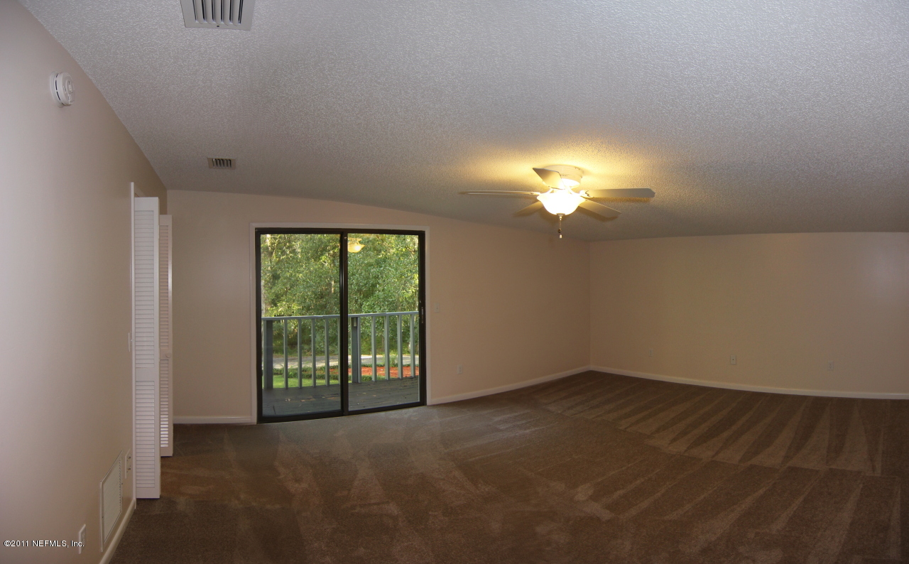 45002 Clemmons Road Callahan, FL 32011 - Photo 4 of 16 Master Bedroom w/ Balcony