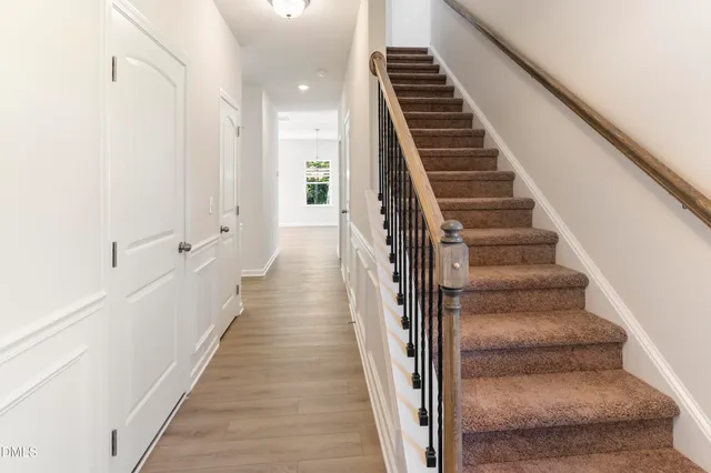 a view of a kitchen with a sink and microwave