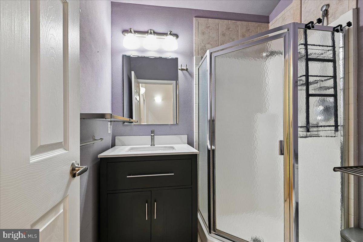 3633 Patuxent River Road Davidsonville, MD 21035 - Photo 45 of 85 Hall Bath with Quartz Counter Vanity & Tile Floor