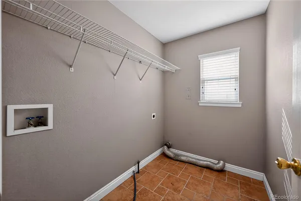 a view of a room with rack on the wall