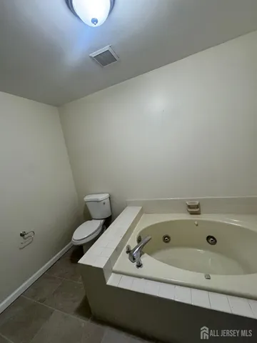 a bathroom with a sink and toilet