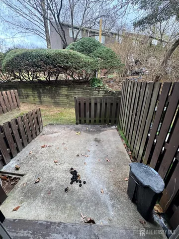 a view of a backyard with sitting area