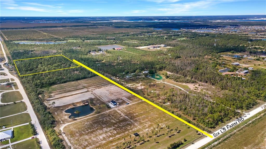 17551 Capper Lane Estero, FL 33928 - Photo 12 of 14 a view of balcony with wooden floor