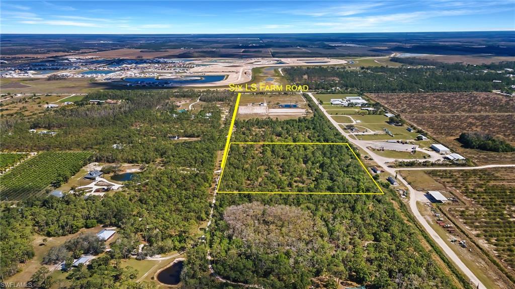 17551 Capper Lane Estero, FL 33928 - Photo 2 of 14 a view of a tennis court
