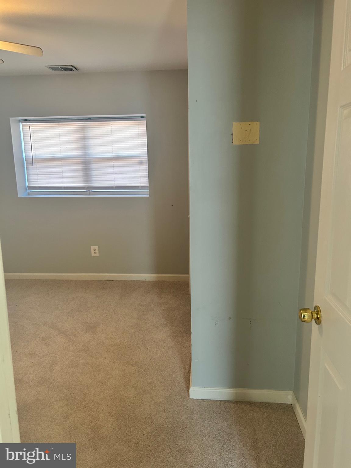 5393 Nelson Point Road Indian Head, MD 20640 - Photo 11 of 23 a view of a small space with wooden floor and a window