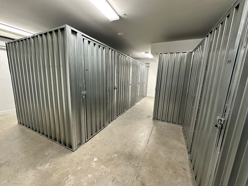 1 Brook Road, Unit 215 Quincy, MA 02169 - Photo 16 of 24 a view of a hallway