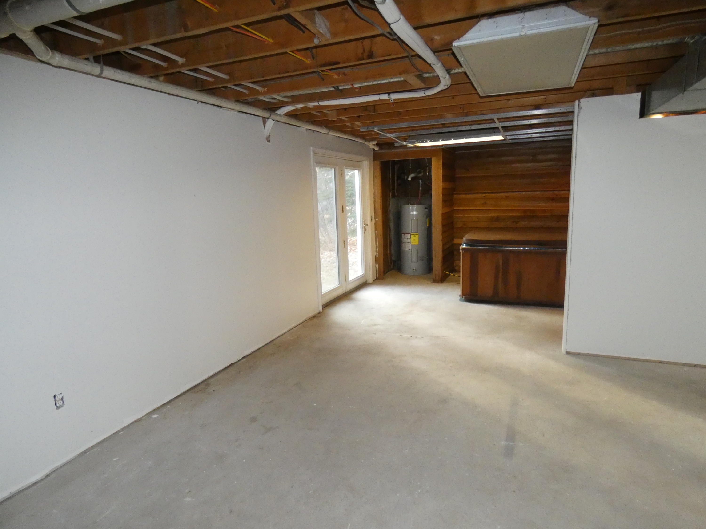 627 Harrison Road Naples, ME 04055 - Photo 35 of 36 Partially Finished Basement