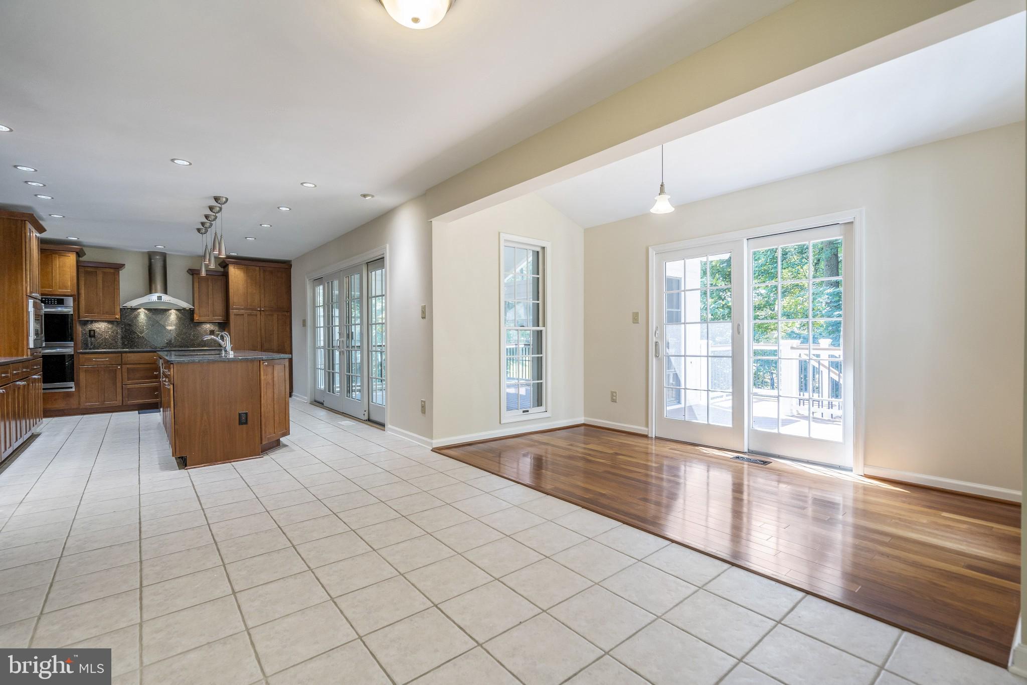 3276 Fox Mill Road Oakton, VA 22124 - Photo 11 of 45 Breakfast nook add-on leads to new deck