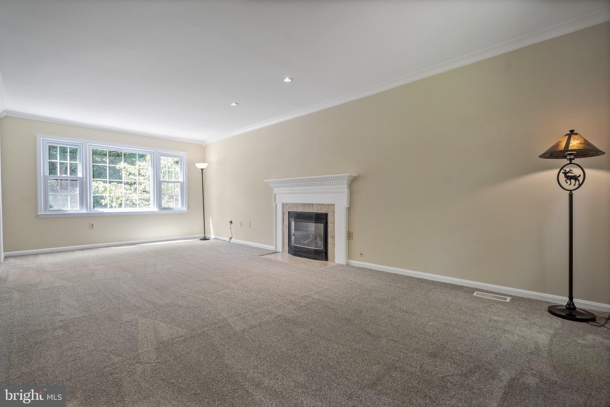 3276 Fox Mill Road Oakton, VA 22124 - Photo 3 of 45 Living room w/ natural gas fireplace, fresh paint