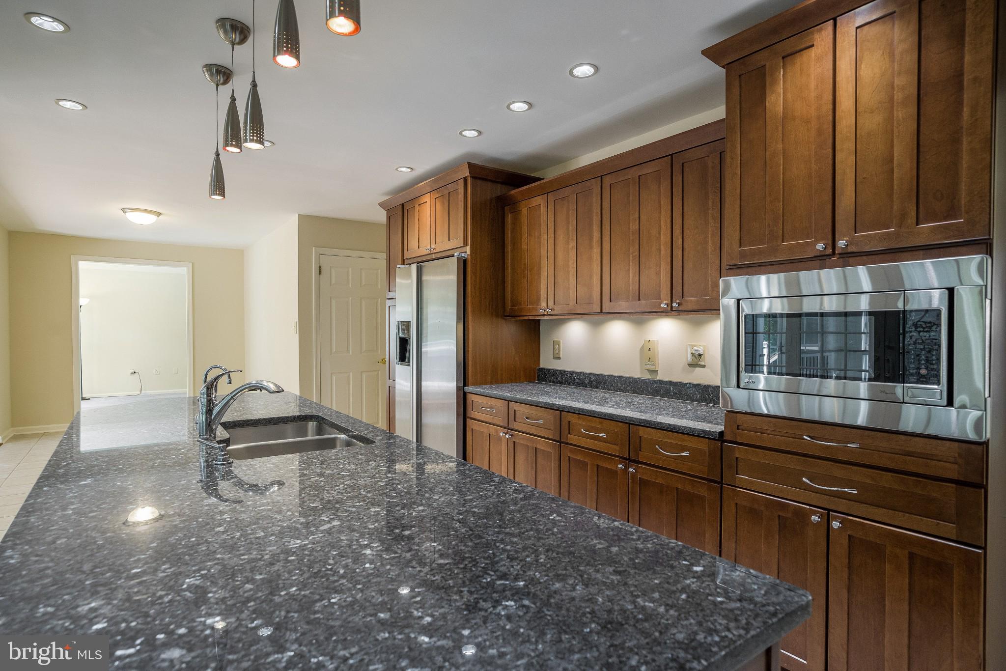 3276 Fox Mill Road Oakton, VA 22124 - Photo 10 of 45 large granite top island w/sink & pendant lights