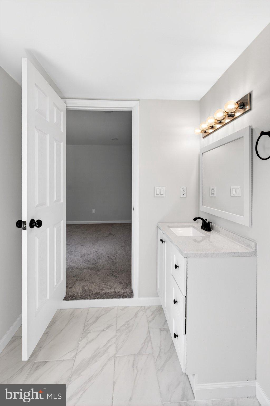 9081 Dumhart Road Laurel, MD 20723 - Photo 29 of 45 Modern bathroom with sleek design.