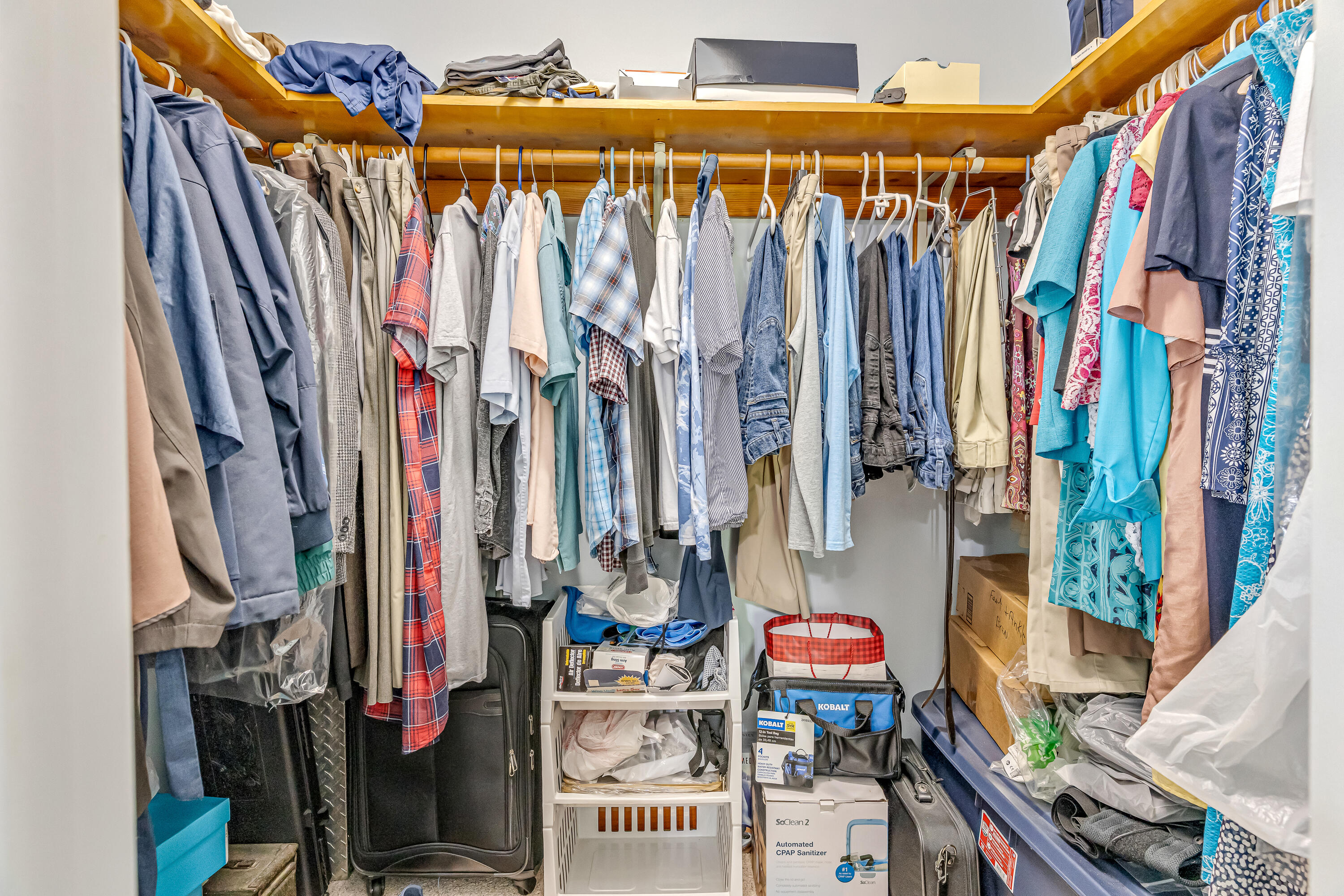 1401 Greenwood Road Baker, FL 32531 - Photo 22 of 61 a view of walk in closet with clothes