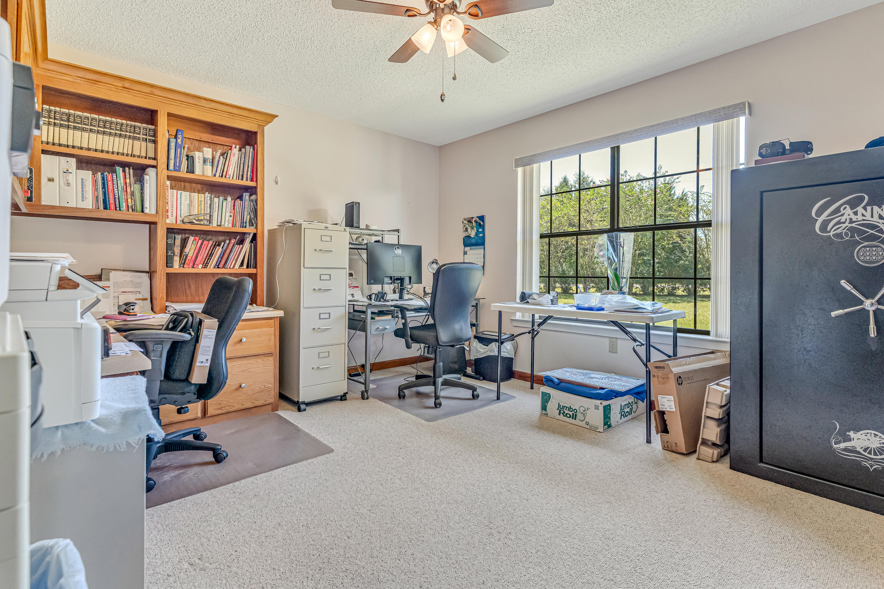 1401 Greenwood Road Baker, FL 32531 - Photo 23 of 61 a view of a livingroom with workspace and a window