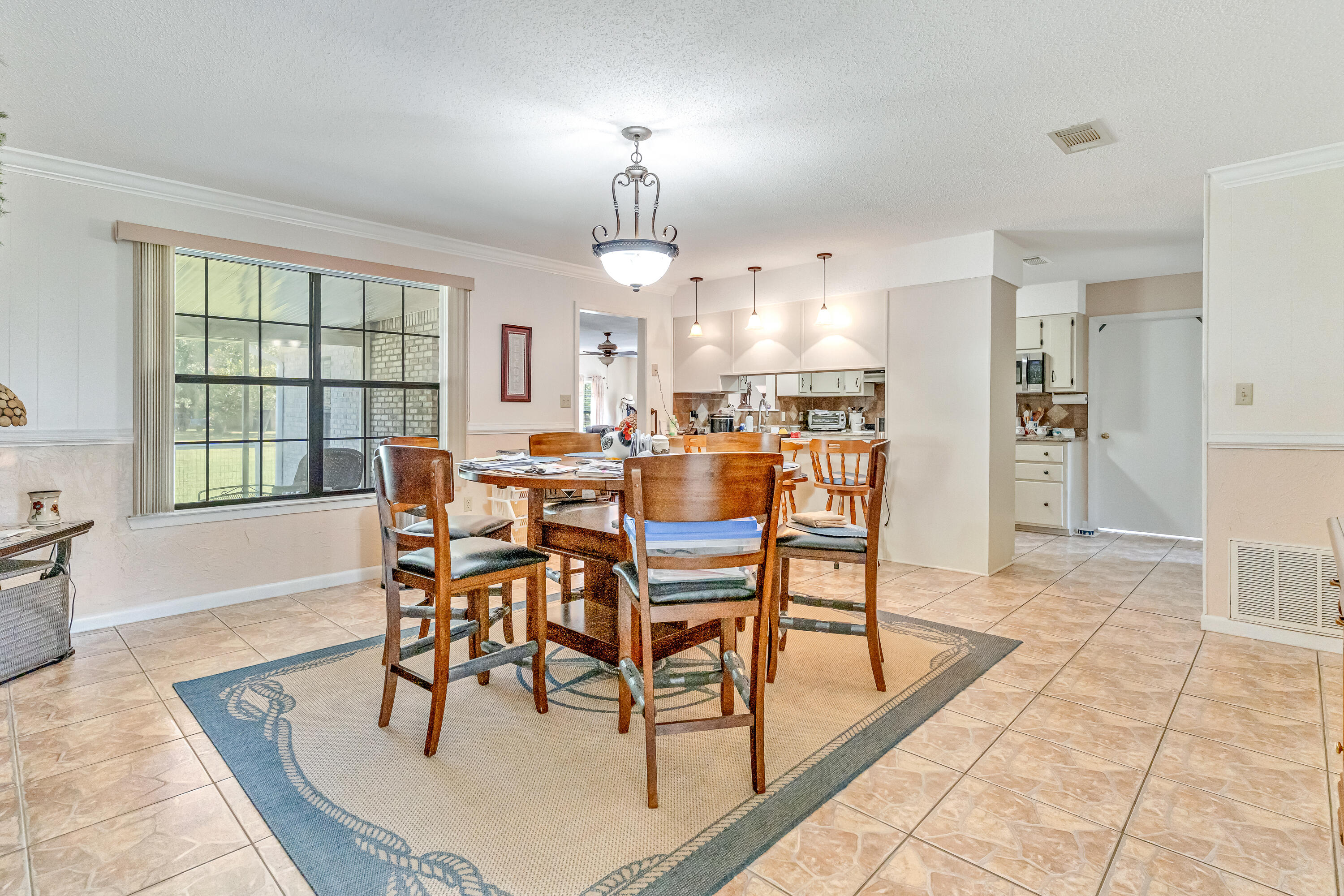 1401 Greenwood Road Baker, FL 32531 - Photo 27 of 61 a view of a dining room with furniture