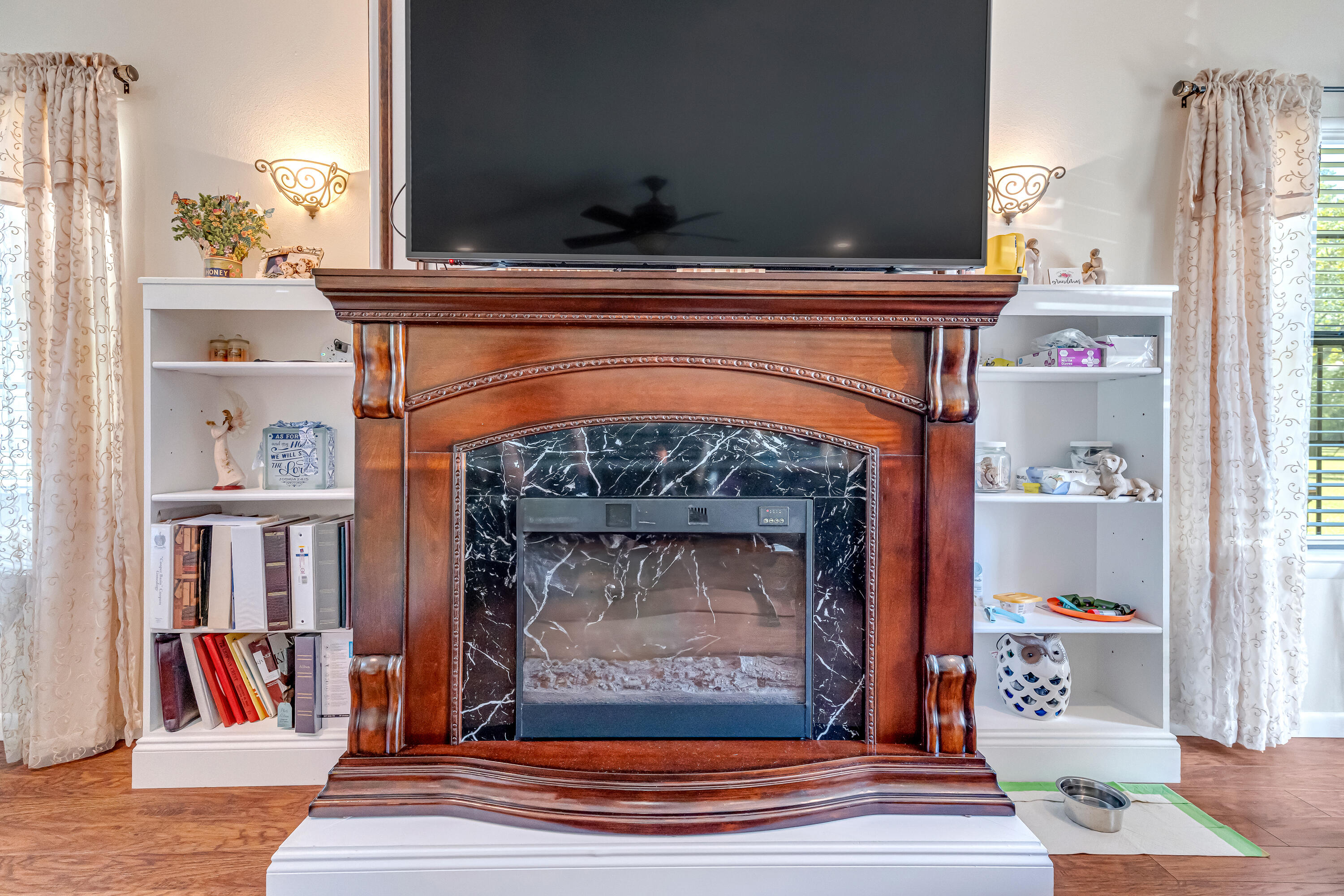 1401 Greenwood Road Baker, FL 32531 - Photo 58 of 61 a living room with furniture and a fireplace