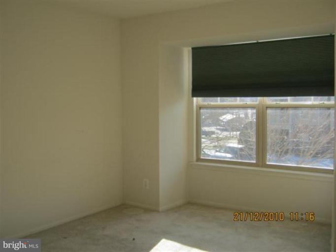 1706 Ascot Way, Unit D Reston, VA 20190 - Photo 5 of 7 Master Bedroom