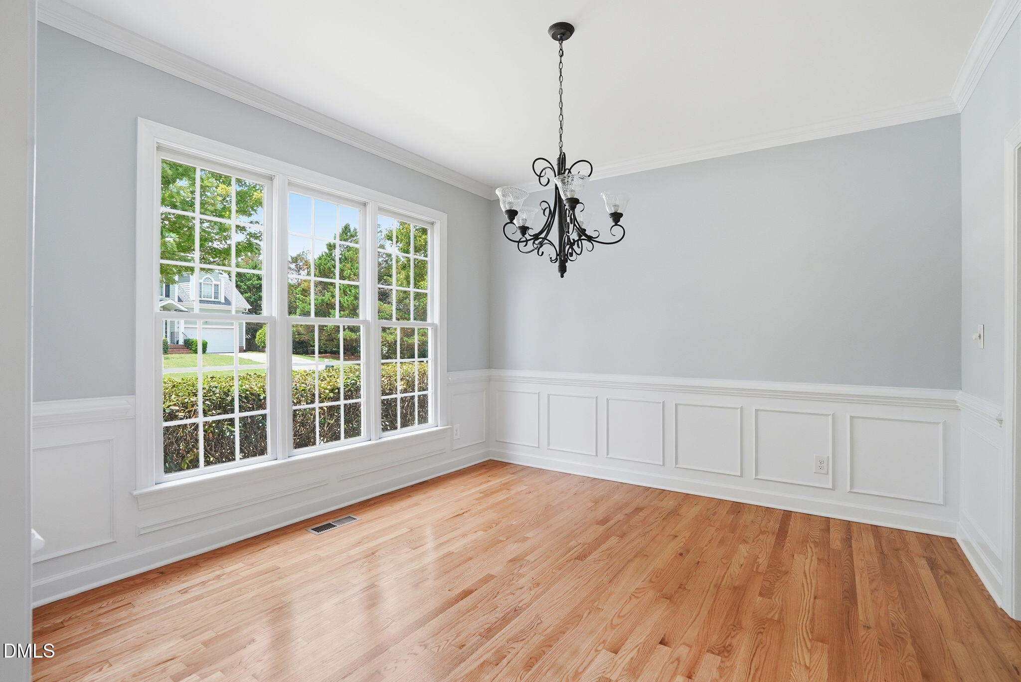 7 Morgans Ridge Lane Durham, NC 27707 - Photo 11 of 75 a view of empty room with wooden floor and fan