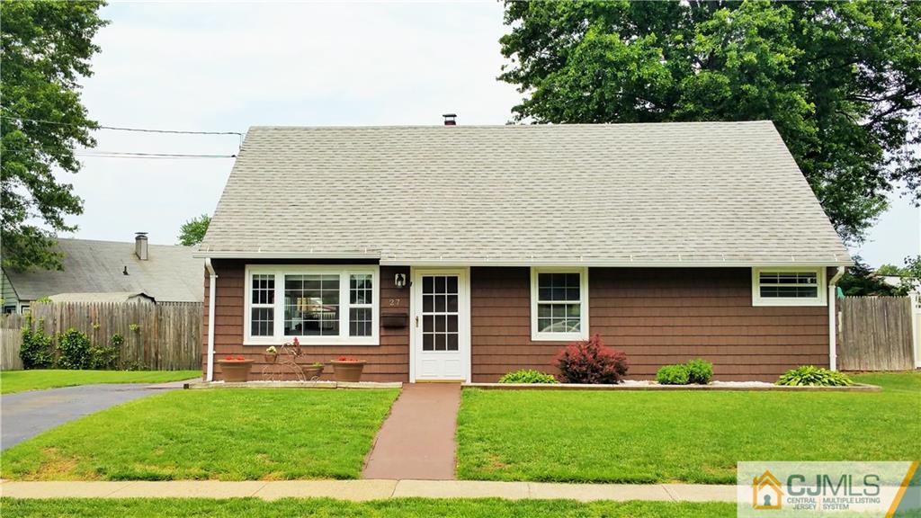 27 Ashley Road Edison, NJ 08817 - Photo 1 of 21 a house with a garden view