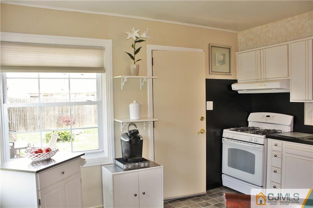 27 Ashley Road Edison, NJ 08817 - Photo 6 of 21 a room with storage and utility