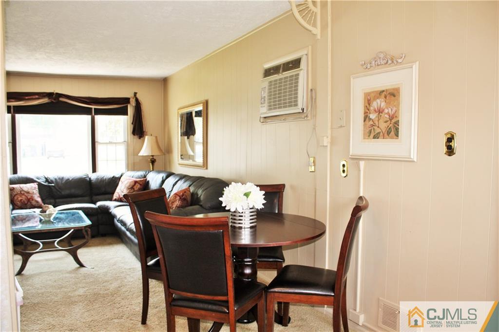 27 Ashley Road Edison, NJ 08817 - Photo 8 of 21 a dining room with furniture and window