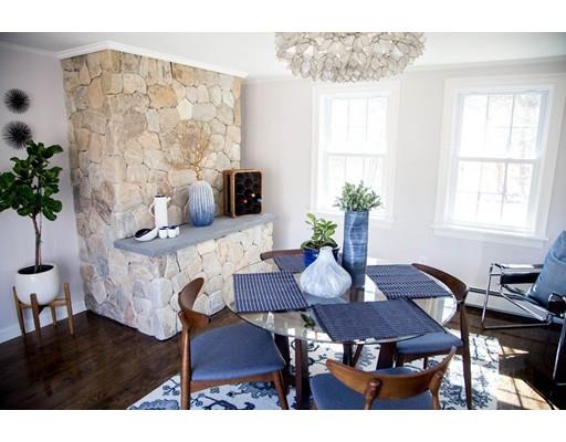 696 Queen Anne Road Harwich, MA 02645 - Photo 14 of 18 a view of a dining room with furniture and wooden floor