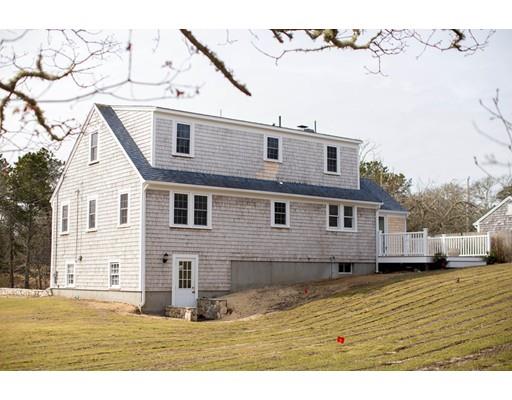 696 Queen Anne Road Harwich, MA 02645 - Photo 3 of 18 a view of a house with a yard