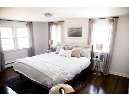 696 Queen Anne Road Harwich, MA 02645 - Photo 4 of 18 a bedroom with a bed and a window