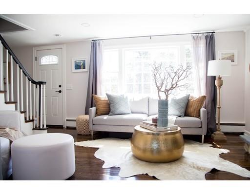 696 Queen Anne Road Harwich, MA 02645 - Photo 5 of 18 a living room with furniture and a large window