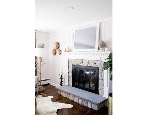 696 Queen Anne Road Harwich, MA 02645 - Photo 6 of 18 a living room with furniture and a fireplace