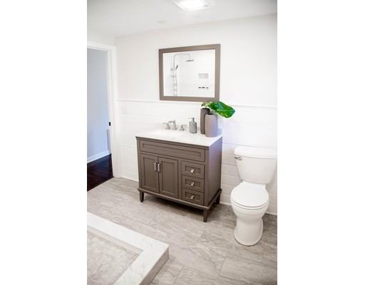 696 Queen Anne Road Harwich, MA 02645 - Photo 10 of 18 a bathroom with a toilet sink and mirror