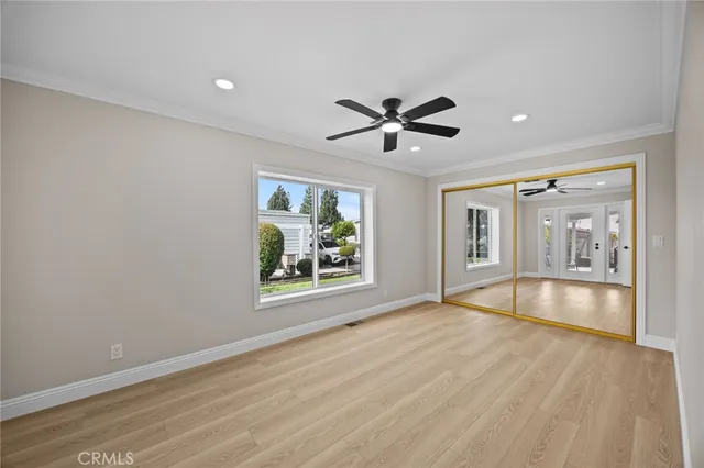 a bathroom with a shower sink mirror and toilet
