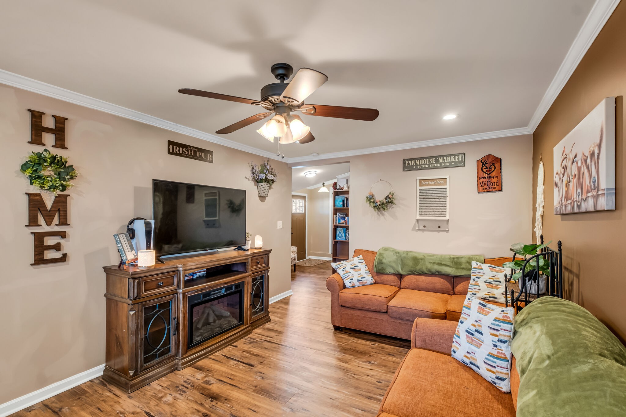 3197 Stephens Road Columbia, TN 38401 - Photo 15 of 46 a living room with furniture and a flat screen tv