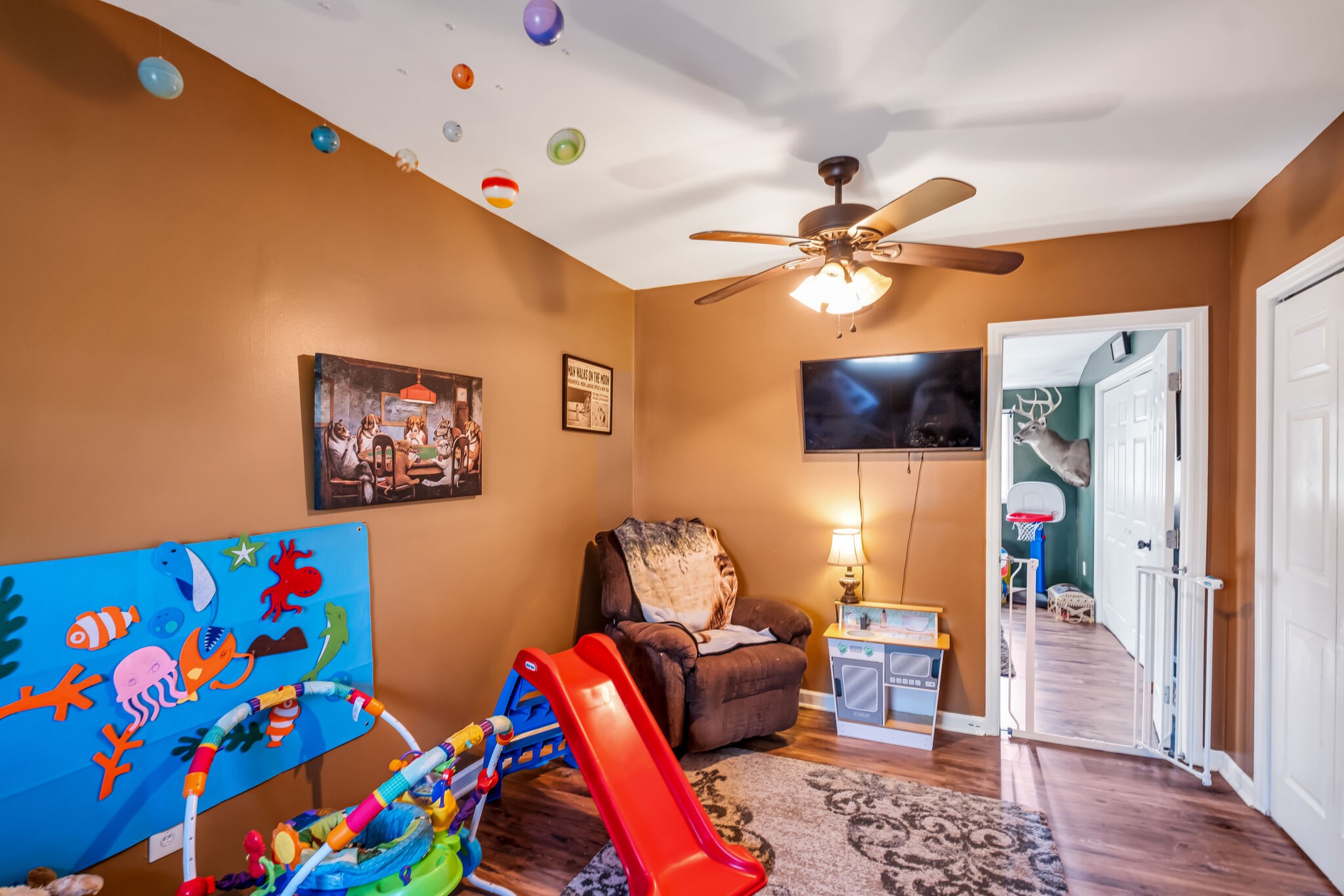 3197 Stephens Road Columbia, TN 38401 - Photo 26 of 46 a living room with furniture and a baby crib